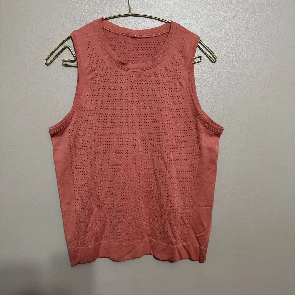 Lululemon women’s tank in salmon color with perforated detail size 6
